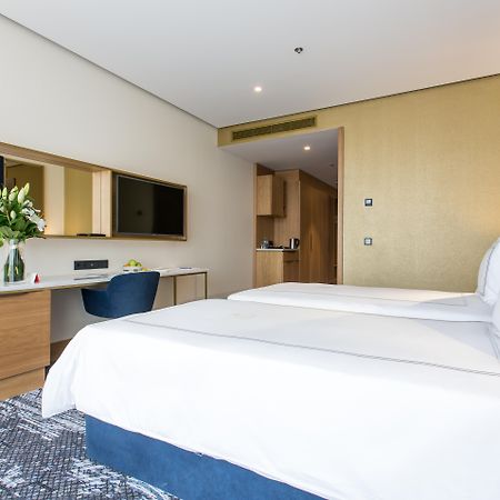 Swissotel SJJ Esterno foto A room at the hotel