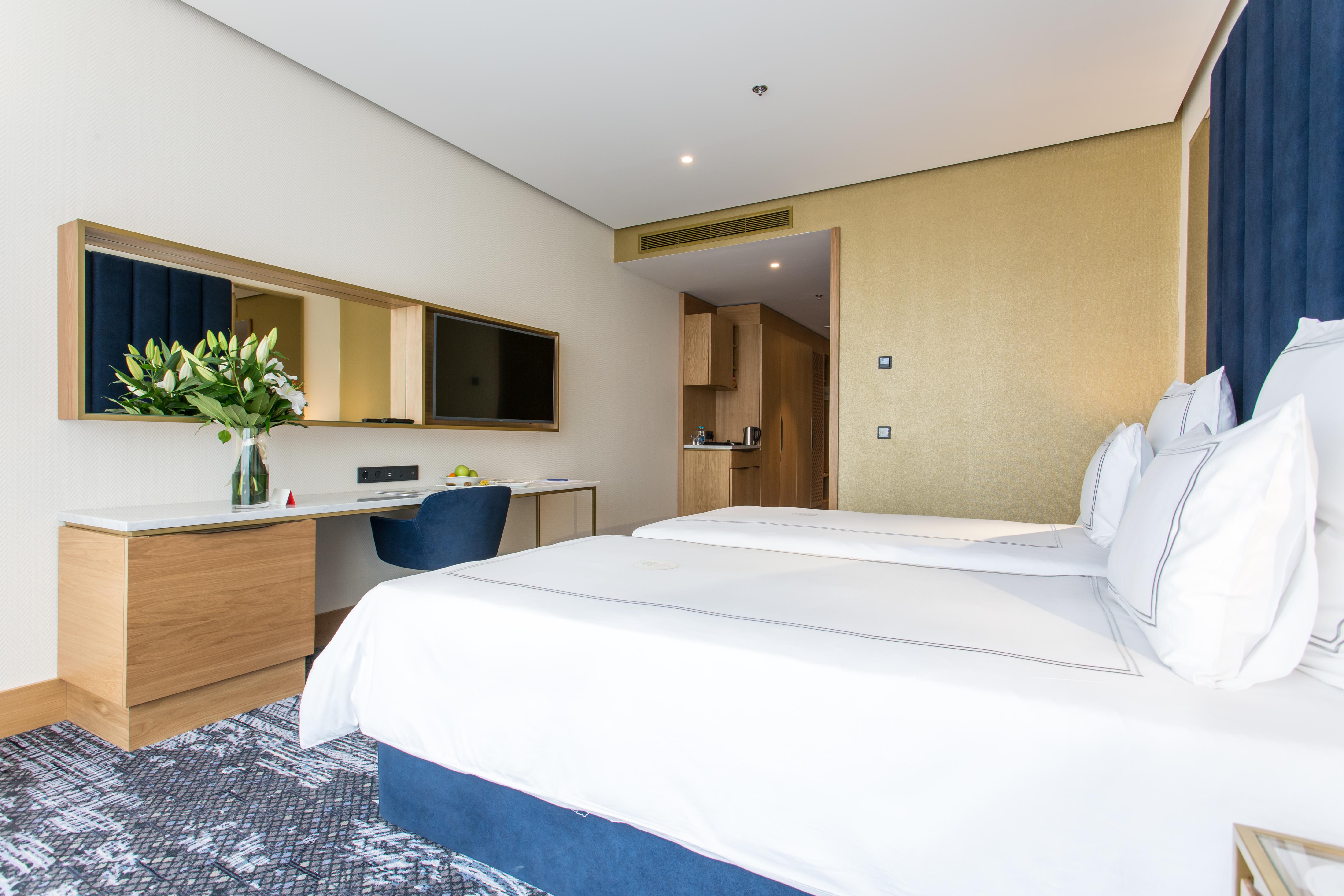 Swissotel SJJ Esterno foto A room at the hotel