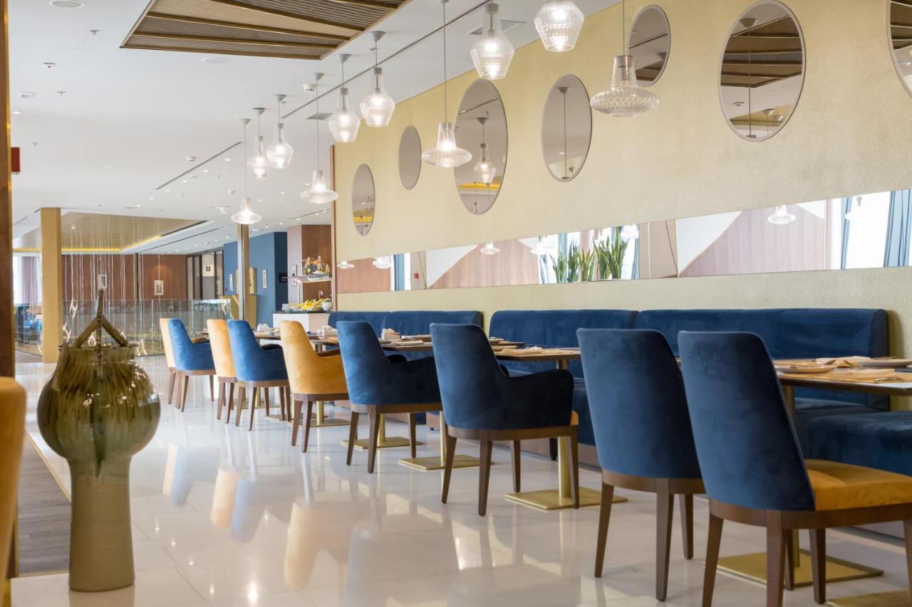 Swissotel SJJ Esterno foto The restaurant