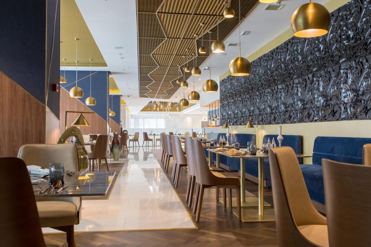 Swissotel SJJ Esterno foto The interior of the restaurant
